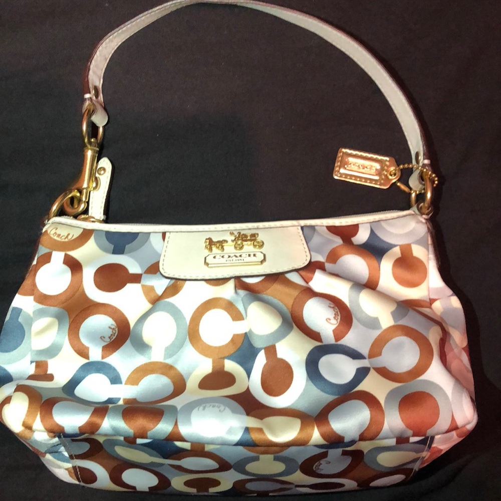 Coach blue,brown & white satin monogram purse.